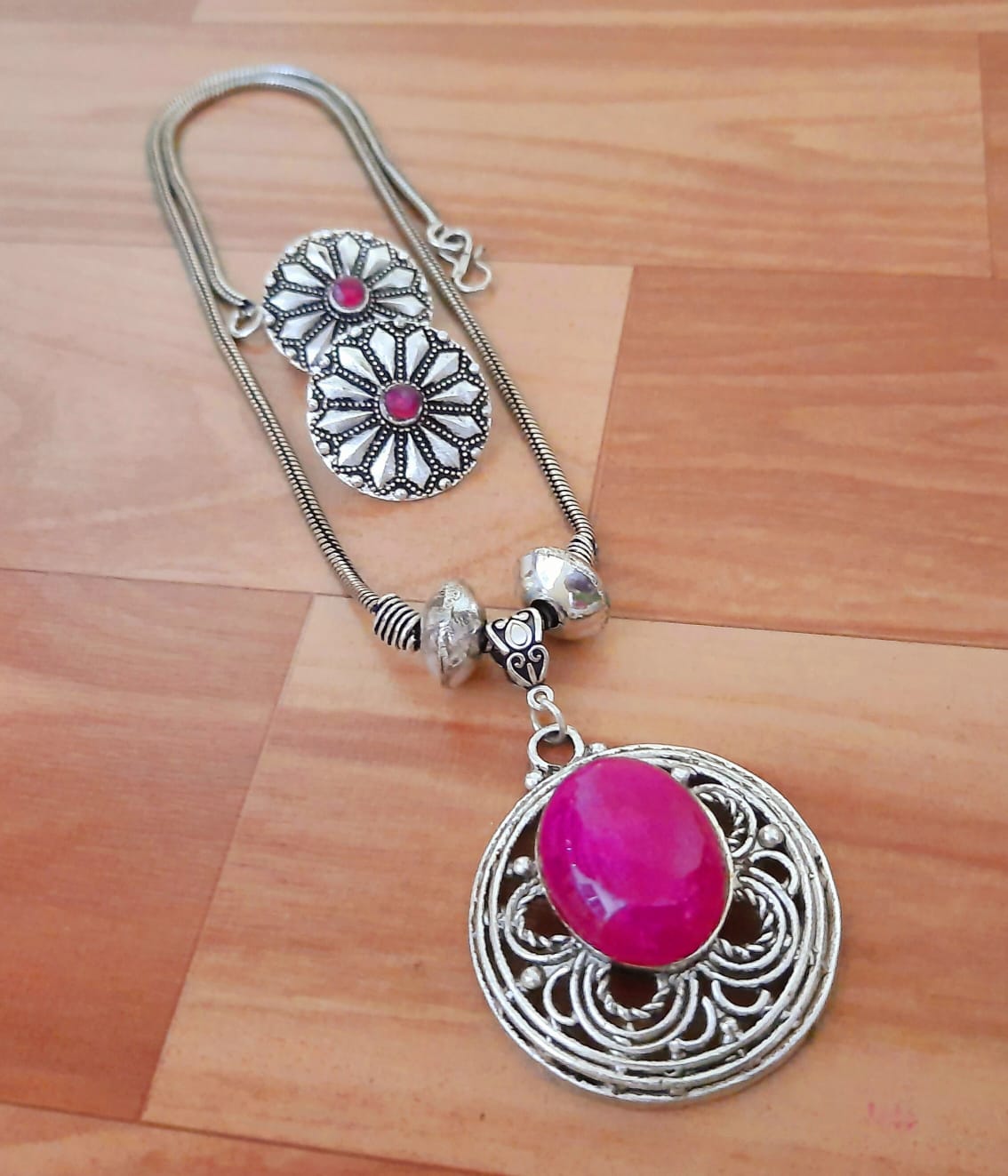 Ornate Silver Pendant Set with Gemstone