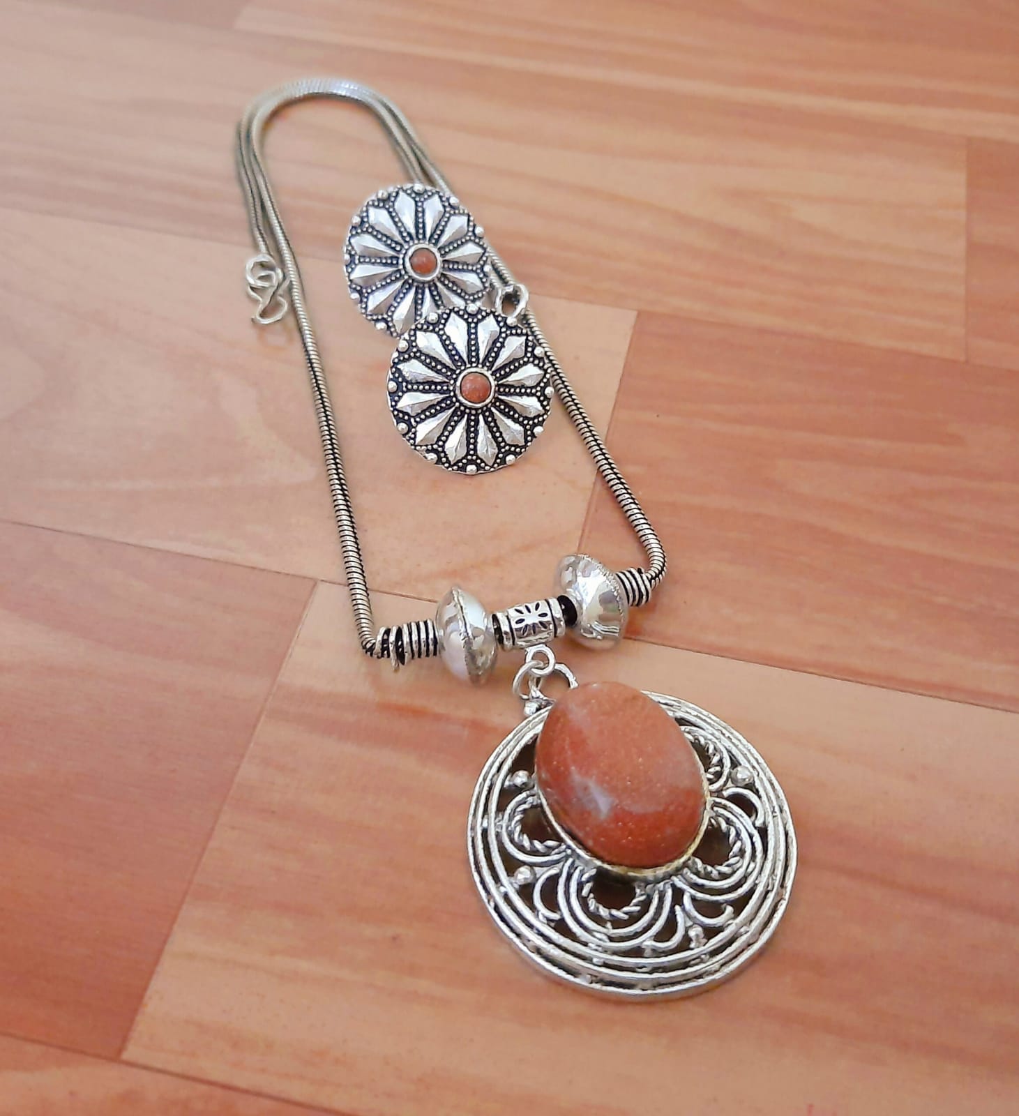 Ornate Silver Pendant Set with Gemstone